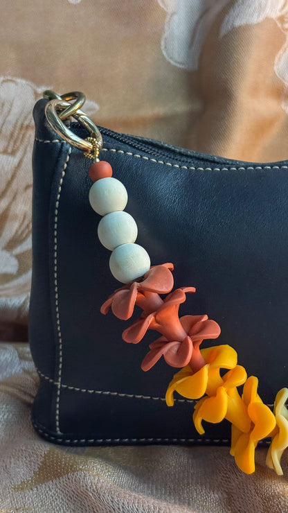 Tri-Ombre Puakenikeni Bag Lei