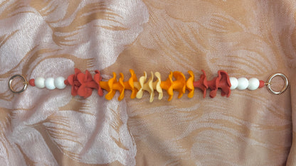 Tri-Ombre Puakenikeni Bag Lei